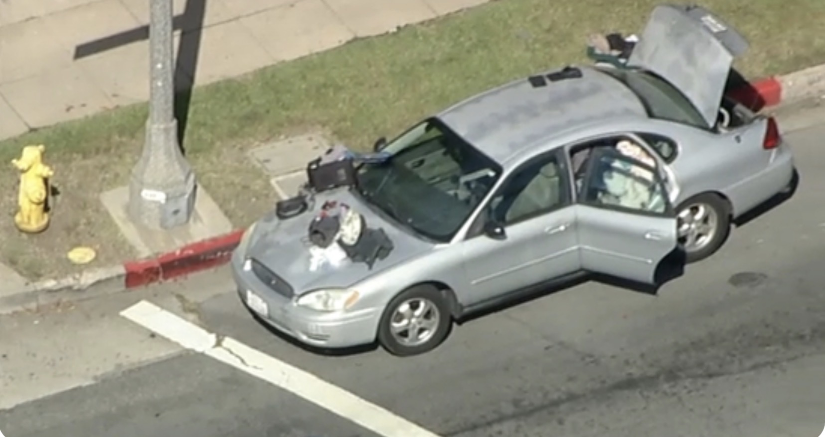 Driver flees traffic stop after man with gunshot wound found in trunk ...